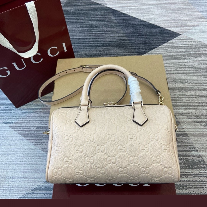 G*u*i top handle bags
